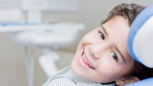 child in dental chair